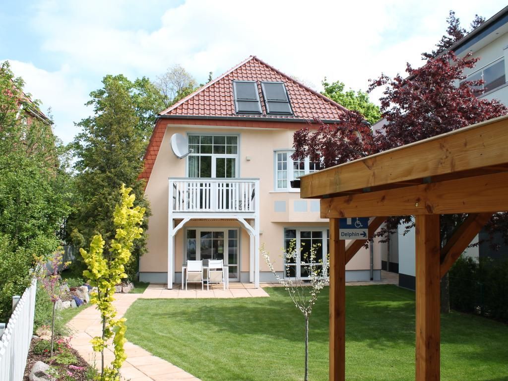Villa Muschel - Blick vom Carport auf die Terrasse der Wohnung