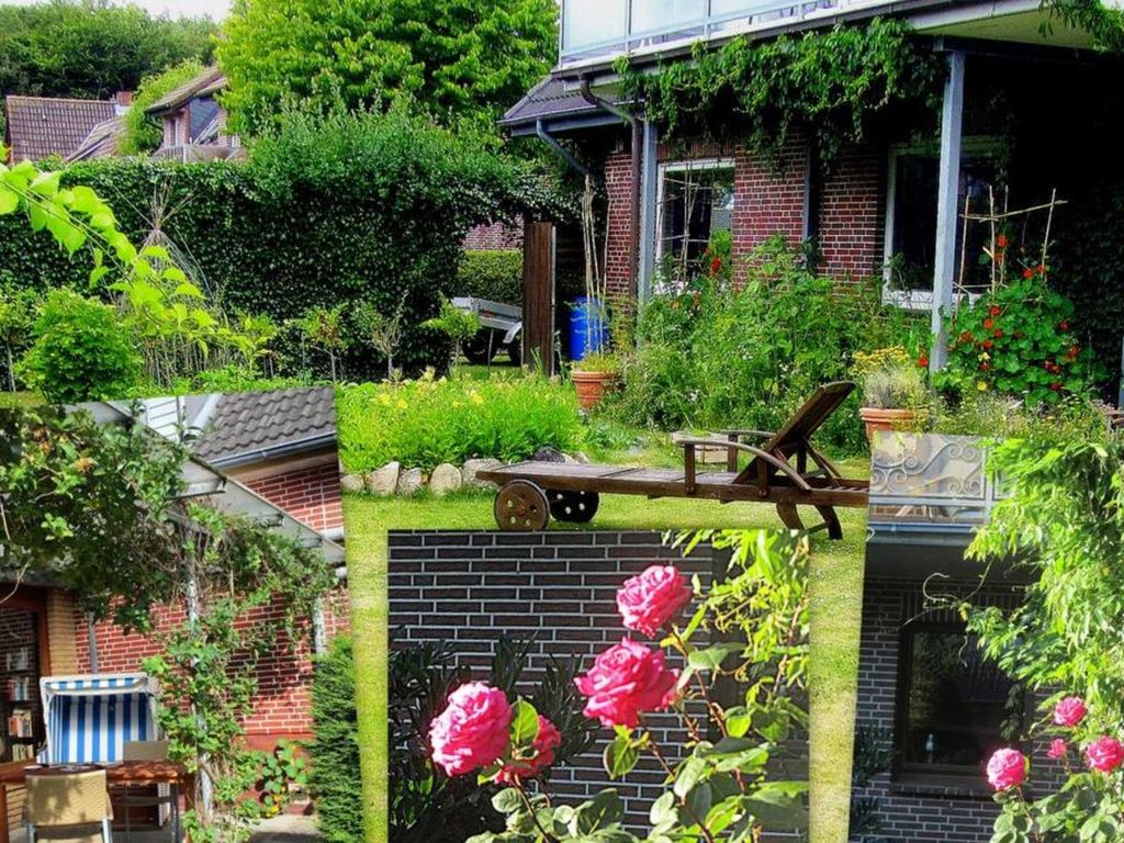 Der Garten in der Pension mit Liegewiese.