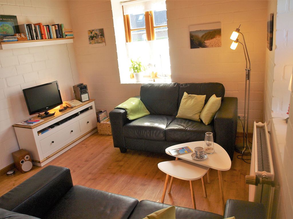 Die Sitzecke mit Sat-TV etc.