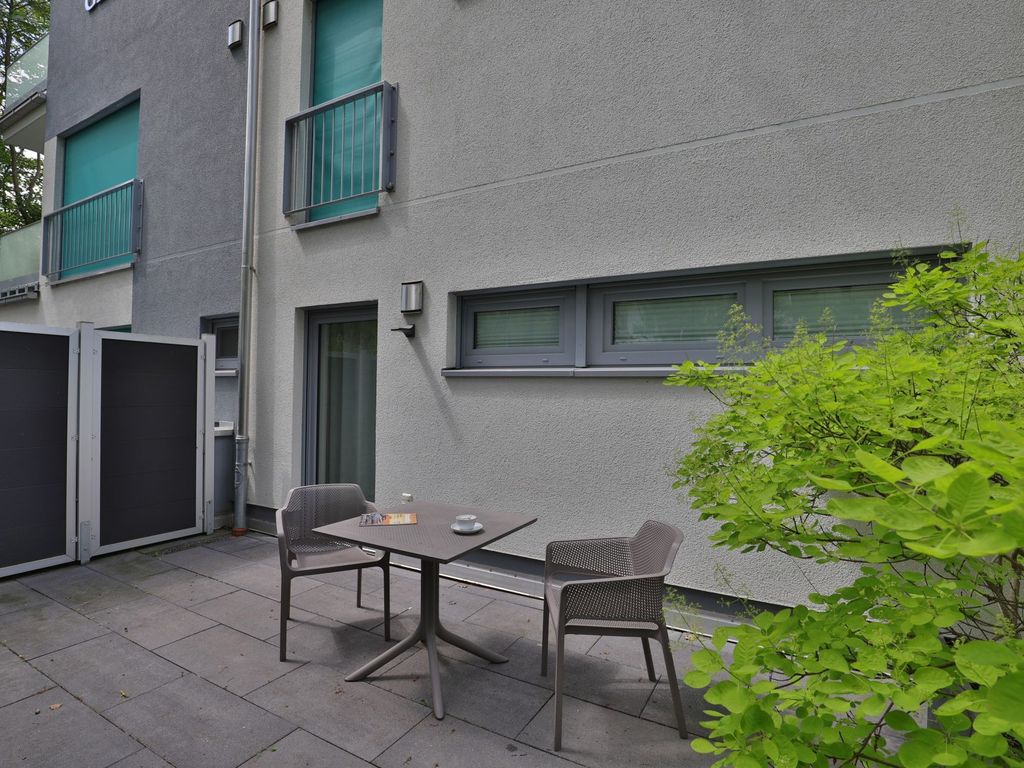 Gezeiten App. 2 Meeresrauschen - Blick auf die kleine Terrasse am Schlafzimmer