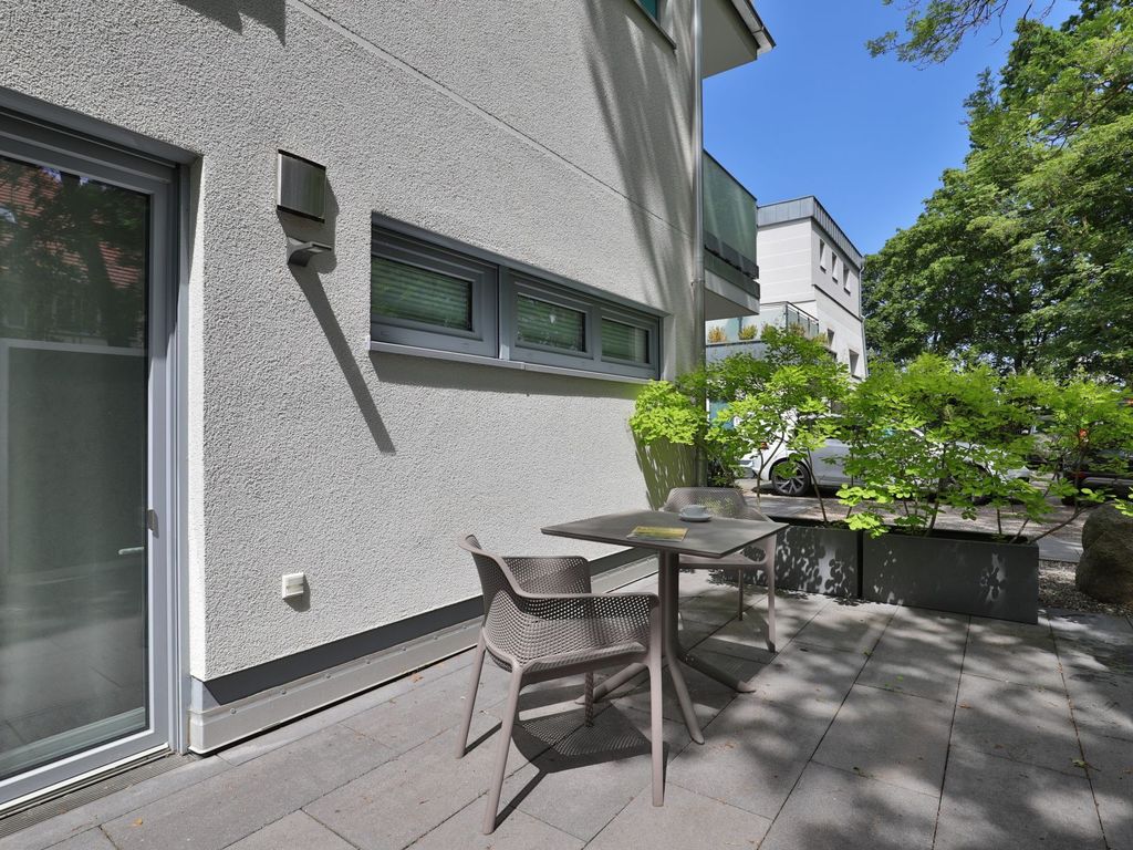 Gezeiten App. 2 Meeresrauschen - Blick auf die kleine Terrasse am Schlafzimmer