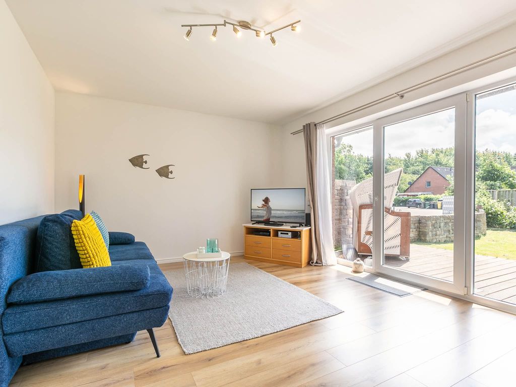 Wohnzimmer mit Südterrasse