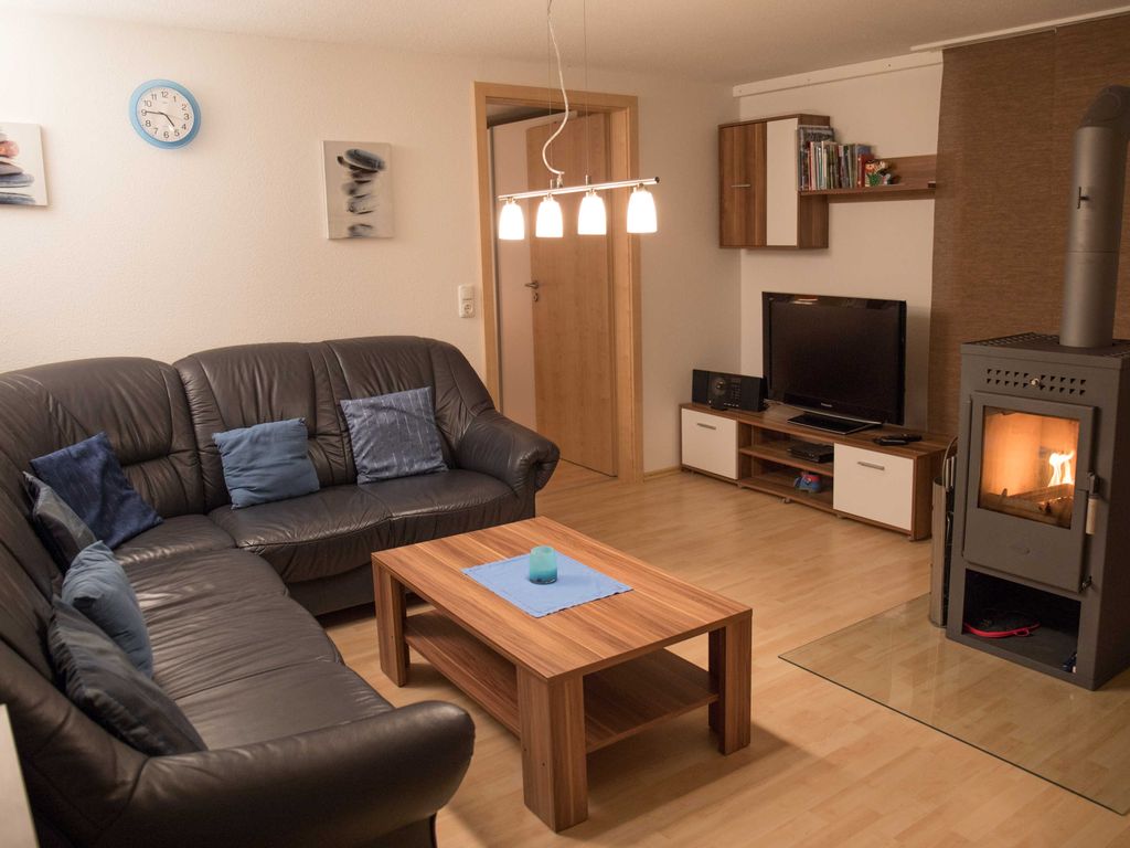 Wohnzimmer mit Kamin