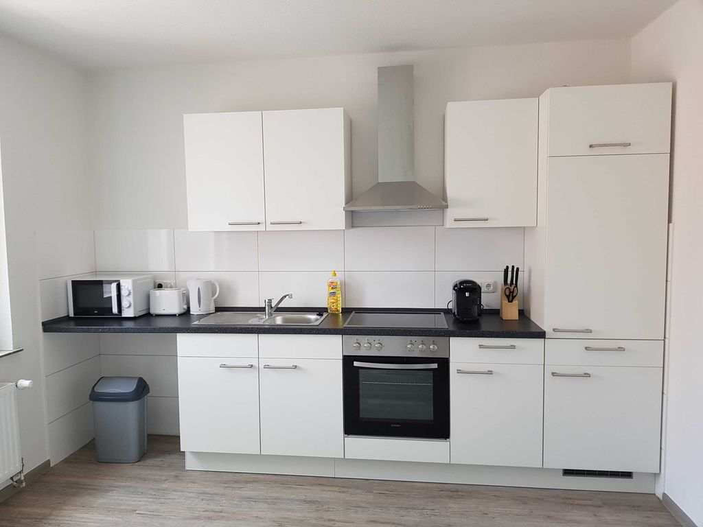 Küche in den Apartments