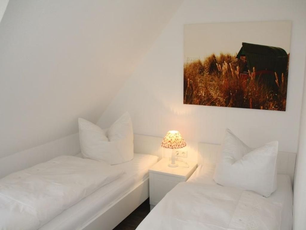 Schlafzimmer mit zwei Einzelbetten