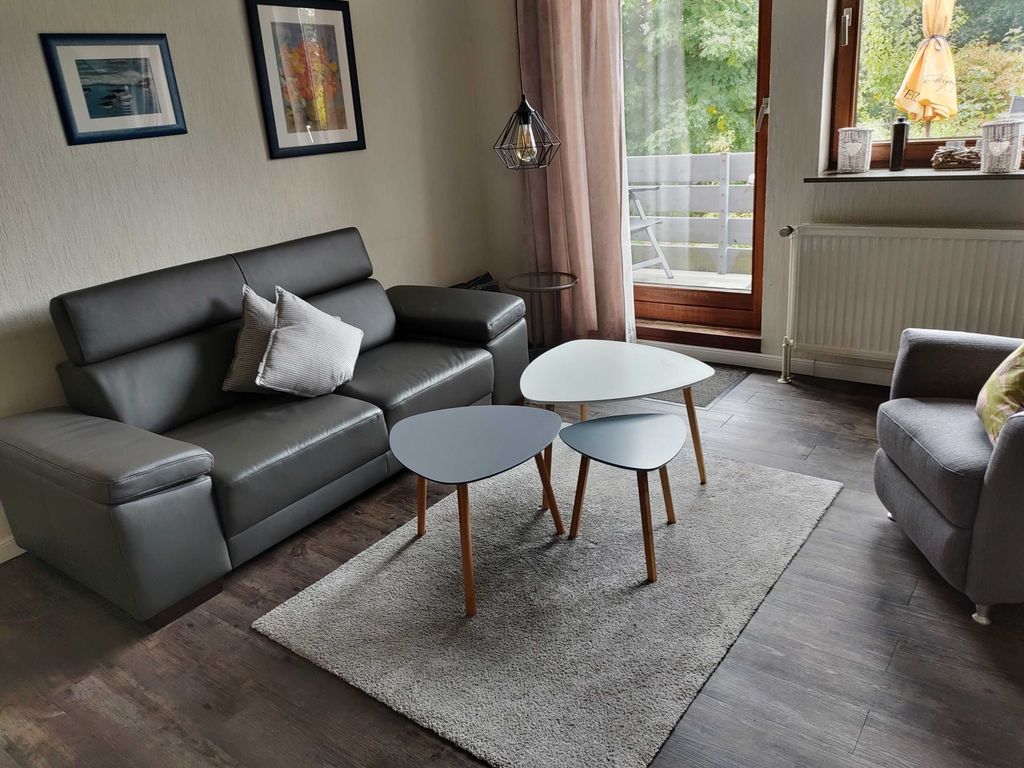 Sitzecke mit Zugang zum Balkon