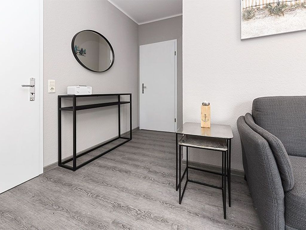 Wohnzimmer mit integriertem Küchenbereich