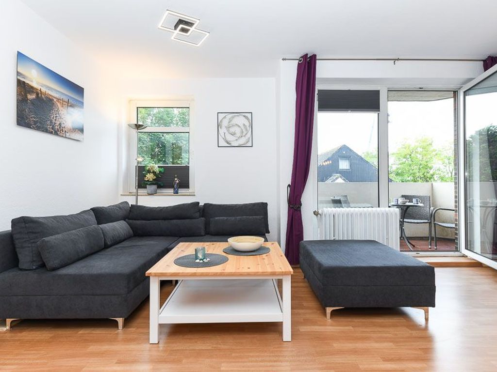 Wohnzimmer mit integriertem Küchenbereich