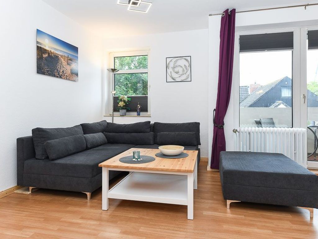 Wohnzimmer mit integriertem Küchenbereich