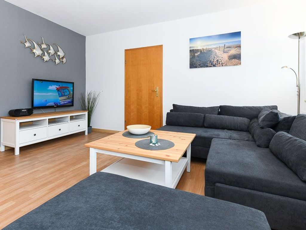 Wohnzimmer mit integriertem Küchenbereich
