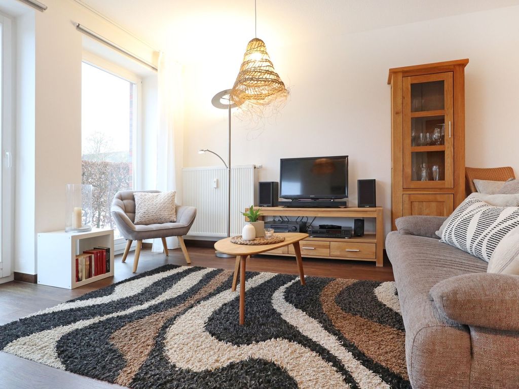Kastanienhof Whg. 01 - Blick auf den gemütlichen Wohnbereich mit TV