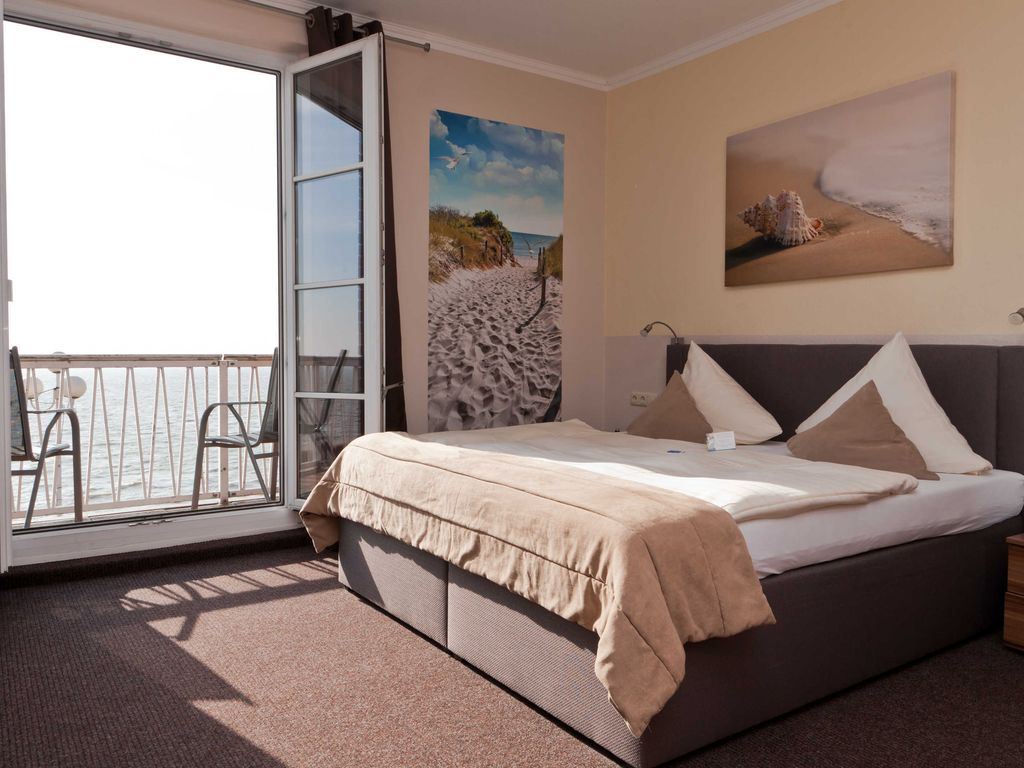 Doppelzimmer mit Balkon und Meerblick