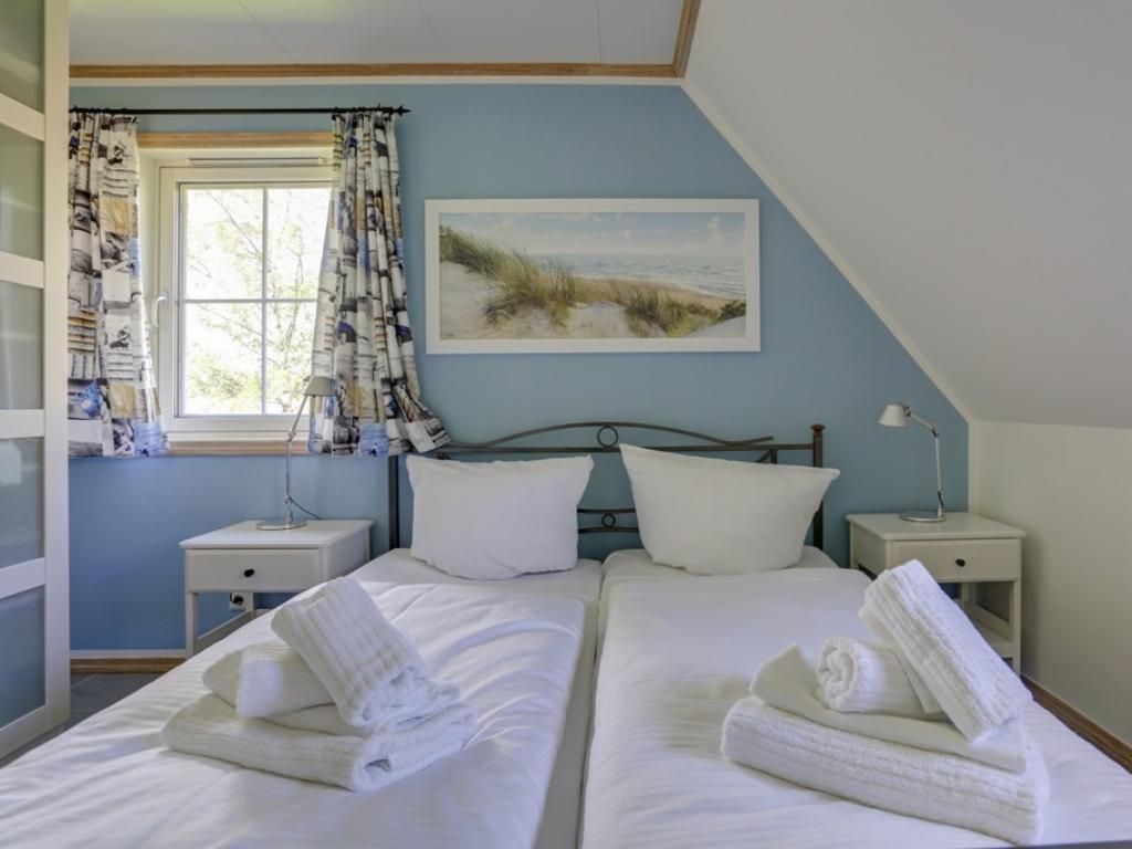 Haus Seepferdchen Whg. 4- Blick in das Schlafzimmer mit Doppelbett