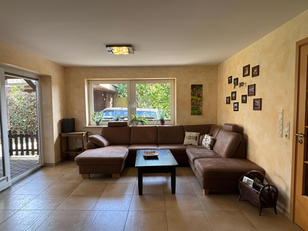 Wohnzimmer mit Schlafcouch EG