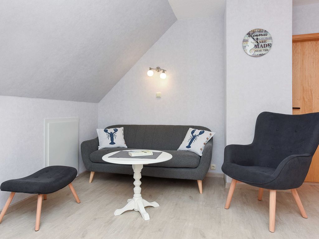 Wohnzimmer mit integriertem Küchenbereich