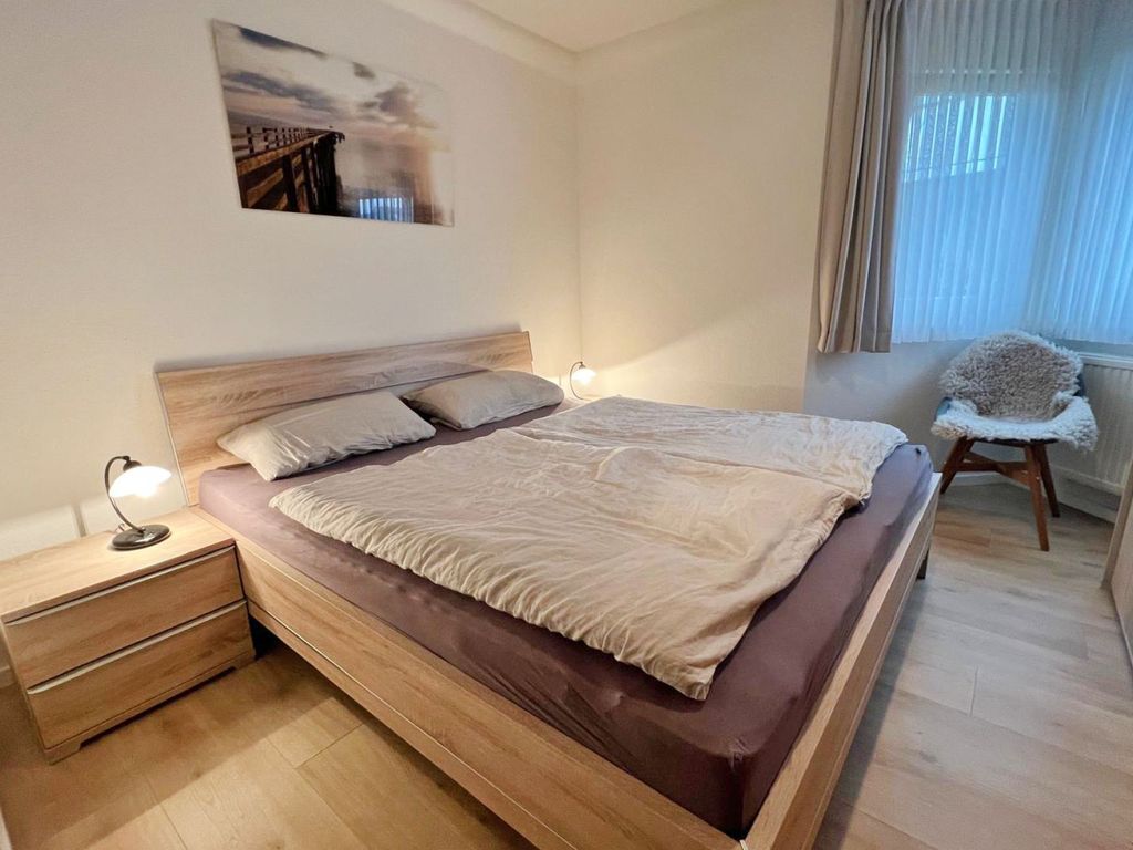 Haus Silbermöwe Whg. SM1 - Blick in das Schlafzimmer mit einem Doppelbett