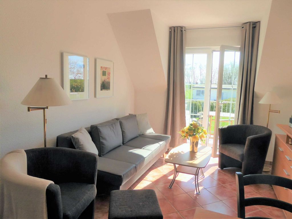 Wohnzimmer mit Schlafsofa
