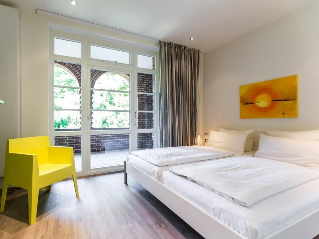 Villa Höger Whg.6 - Blick in das Schlafzimmer mit Zugang auf die Loggia