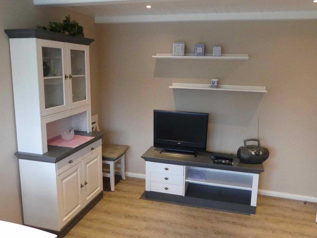 Gamütliches Wohnzimmer mit SAT TV.