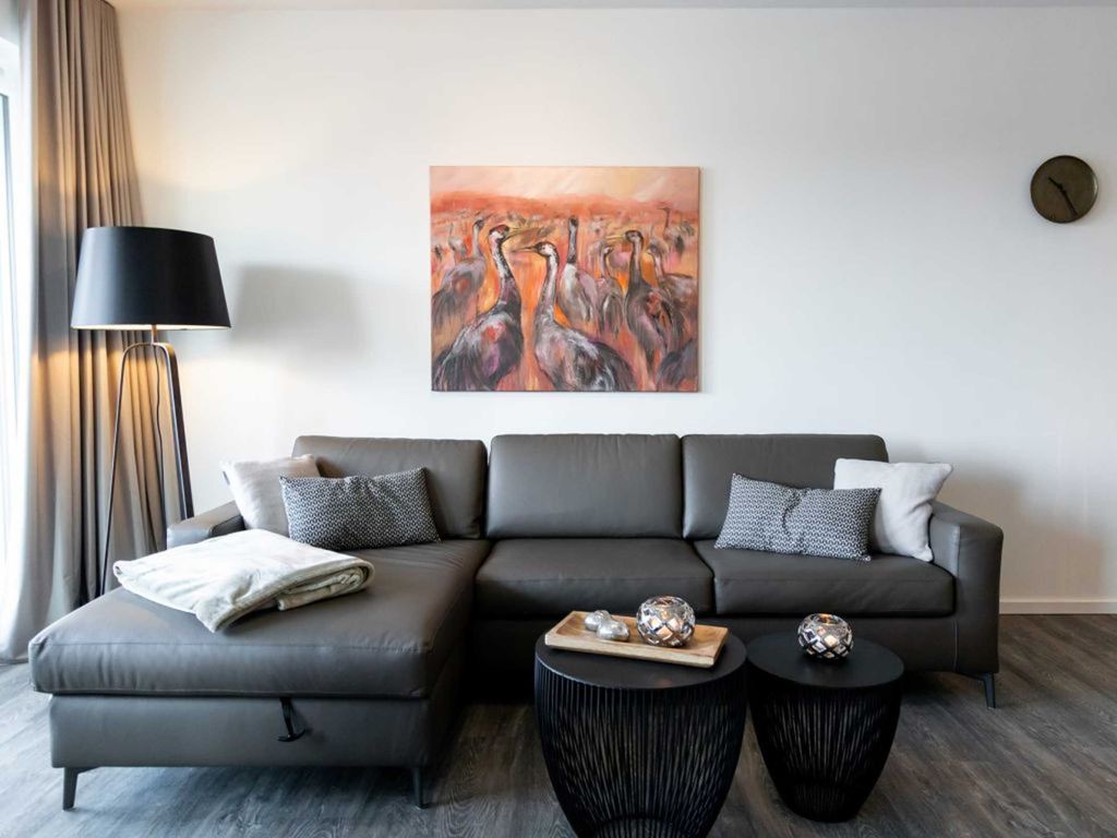 Hafenspitze App.24- gemütliches Sofa im Wohnbereich