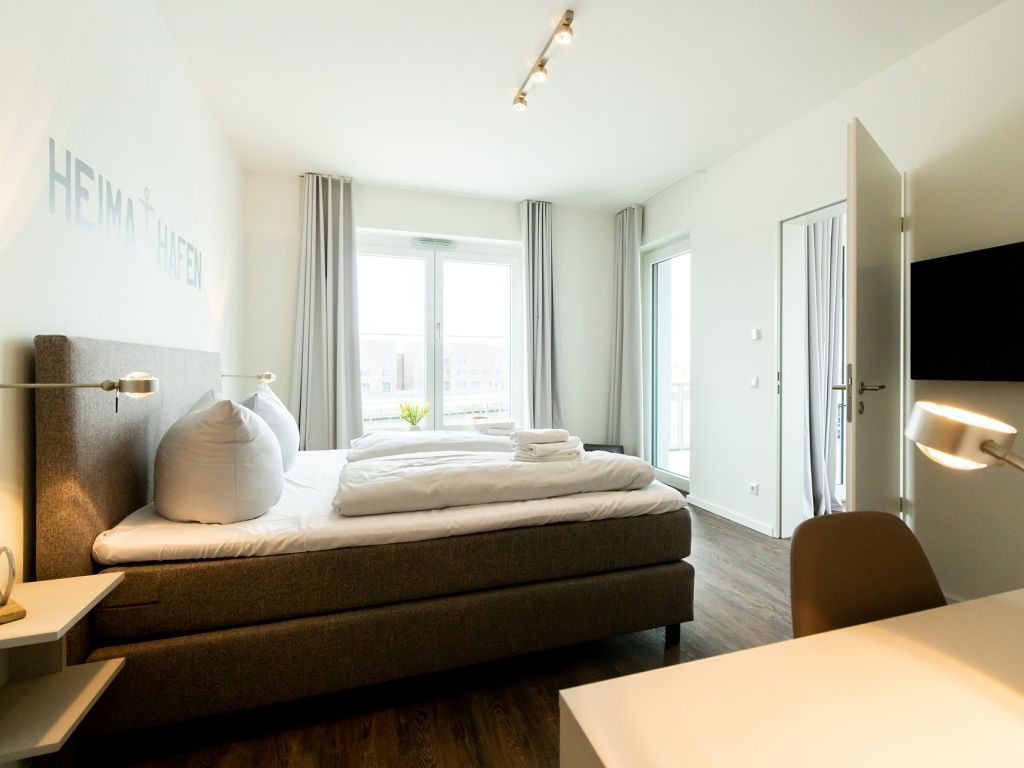 Hafenspitze App. Pier 2.16 - Blick in das Schlafzimmer hinten links