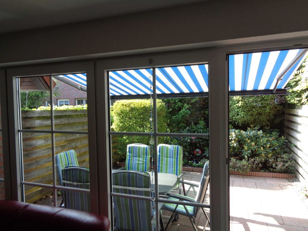 Begrünte, umzäunte Terrasse