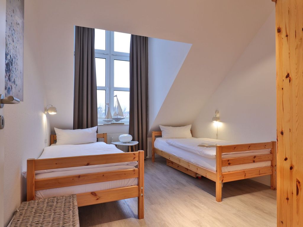 Sünnslag App.13/59 - Blick in das Kinder-/ Gästezimmer mit 2 Einzelbetten