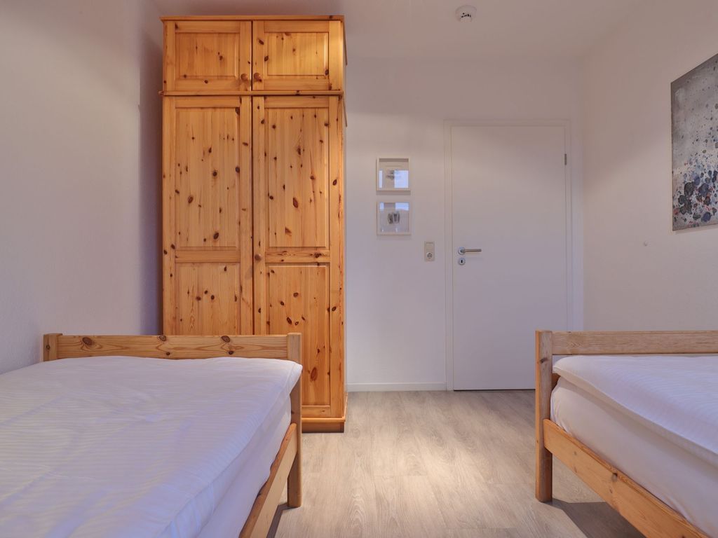 Sünnslag App.13/59 - Blick in das Kinder-/ Gästezimmer mit 2 Einzelbetten