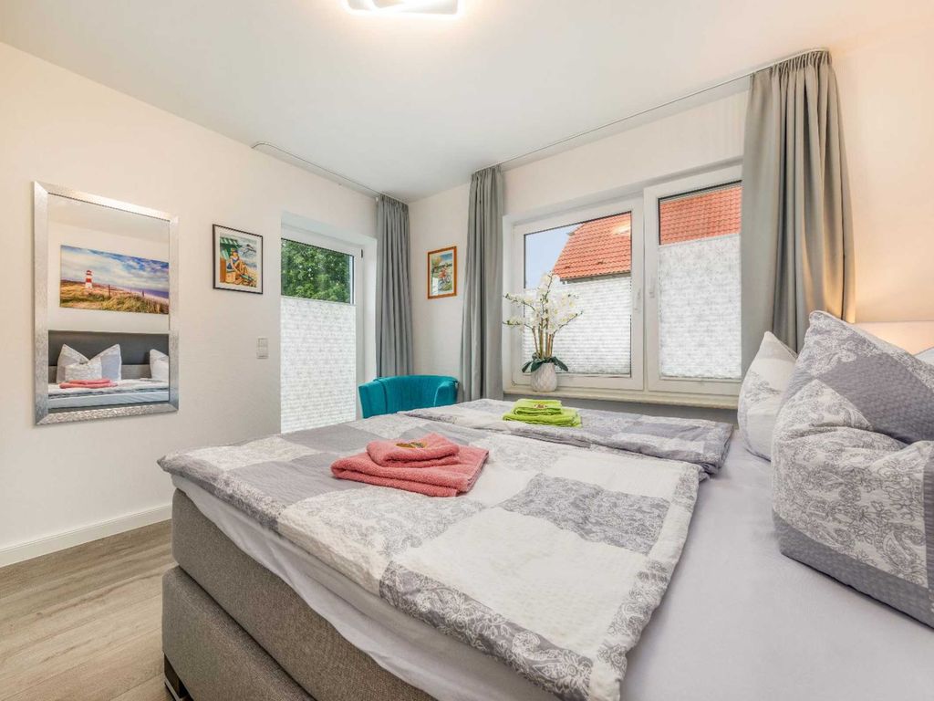 Schlafzimmer mit Zugang zur Terrasse
