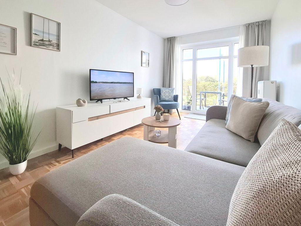 Haffblick Whg.21 - Blick auf den gemütlichen Wohnbereich mit Terrassenzugang