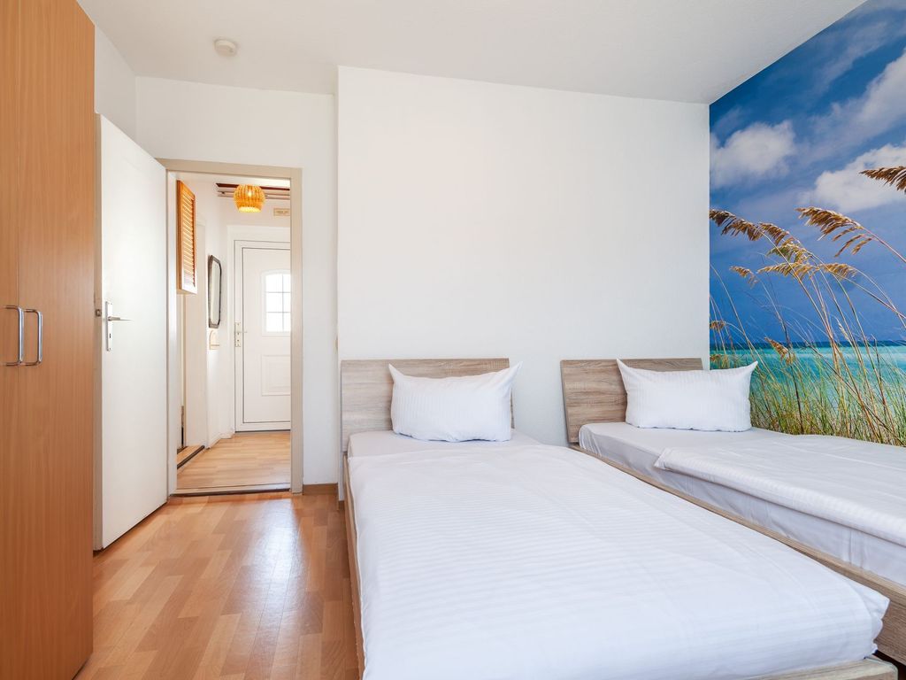 Mariannenweg 7 - Blick in das Schlafzimmer mit zwei Einzelbetten
