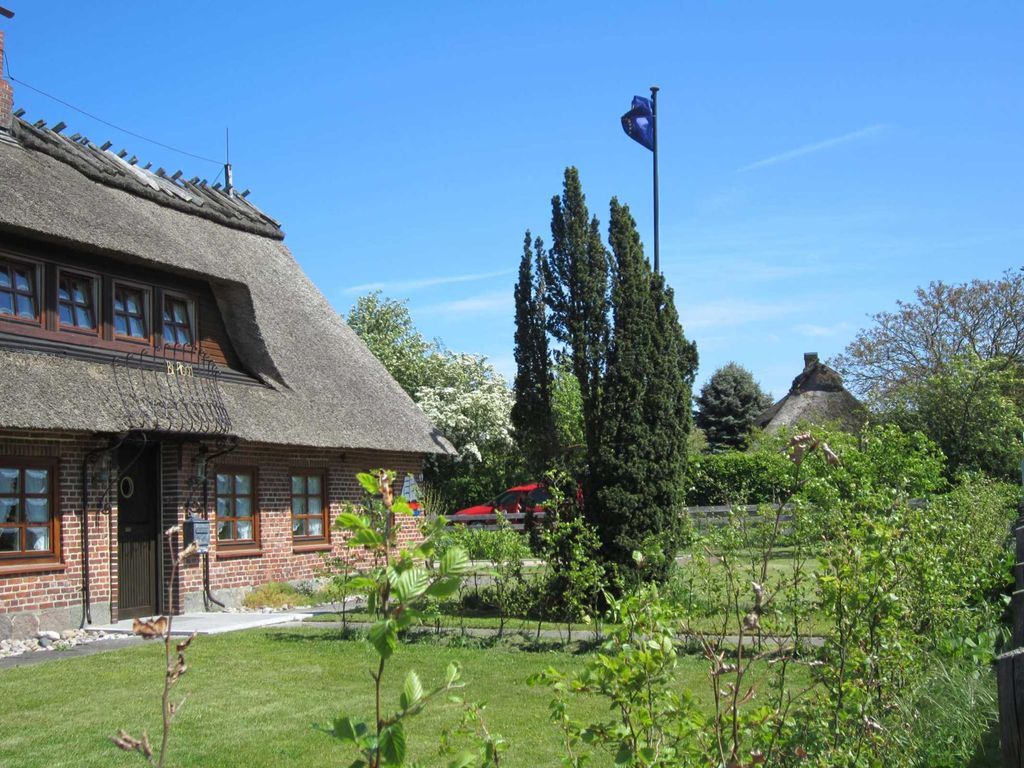 Wohnen unter Reet Ferienwohnung Midgard EG und Ferienwohnung Godewind OG