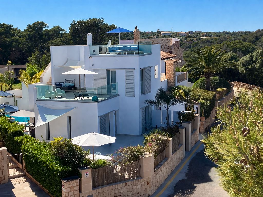 Casa Poggibonsi, Cala Llombards, Passeig de la Mar 19