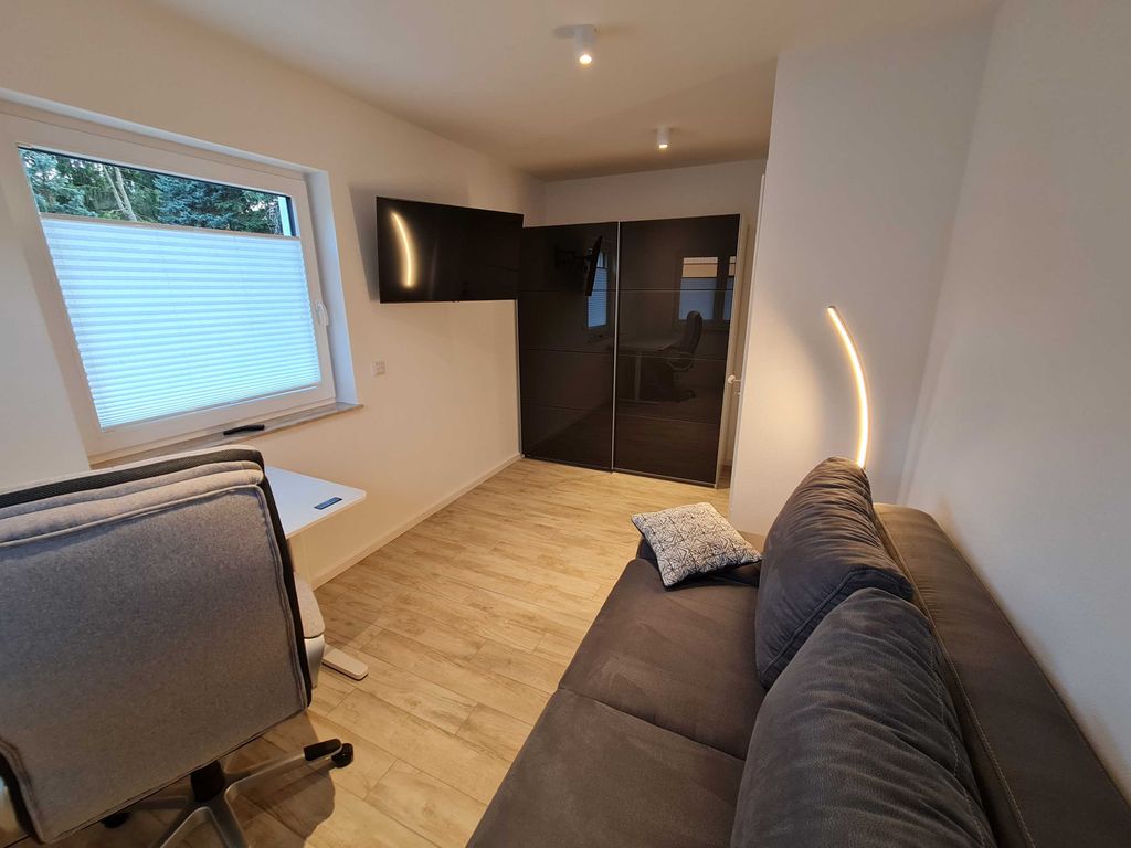 Arbeitszimmer mit Schlafcouch