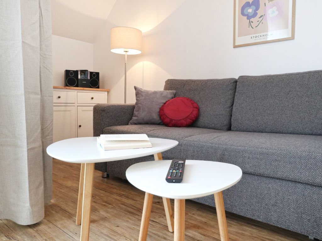 Haffblick Whg. Ha32 - Blick auf den Wohnbereich mit Schlafsofa