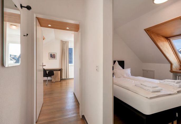 Wohnung Dach zur Inselseite mit Balkon