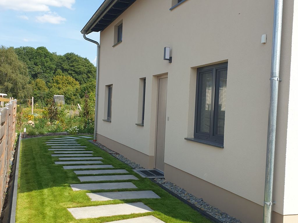 Ansicht Nord-West-Seite mit Zugang Whg 3 und Loft 2