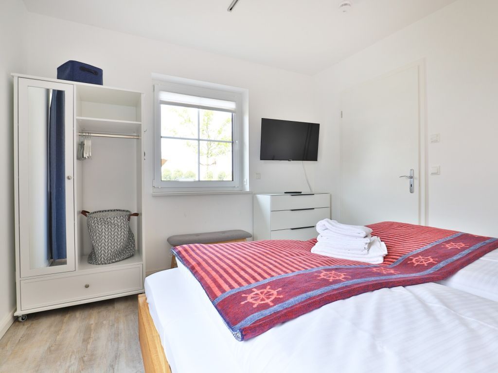 Kapitänshaus - Blick in das Schlafzimmer im EG