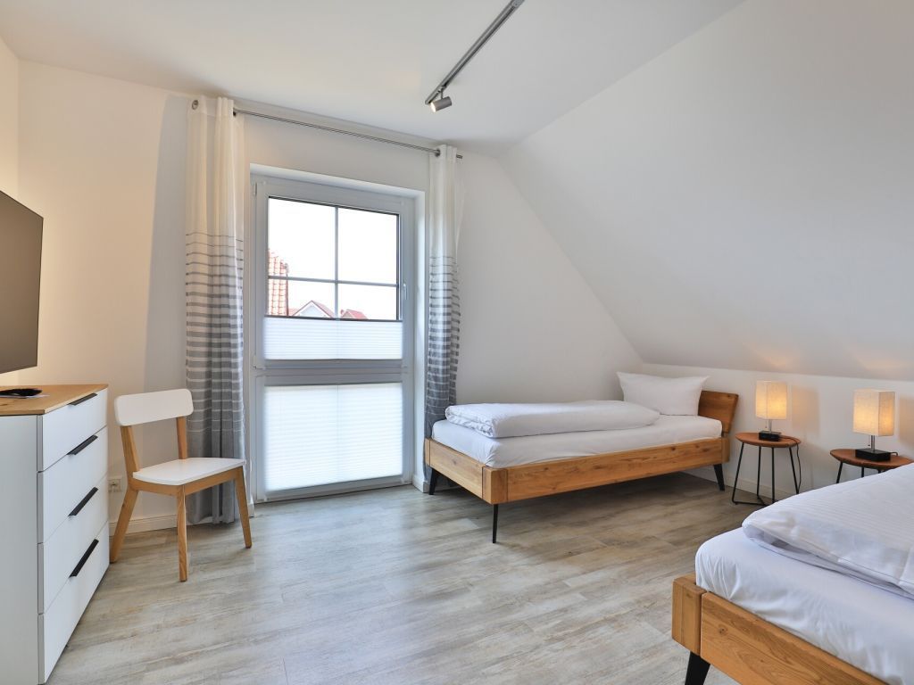 Kapitänshaus - Blick in das Schlafzimmer mit zwei Einzelbetten