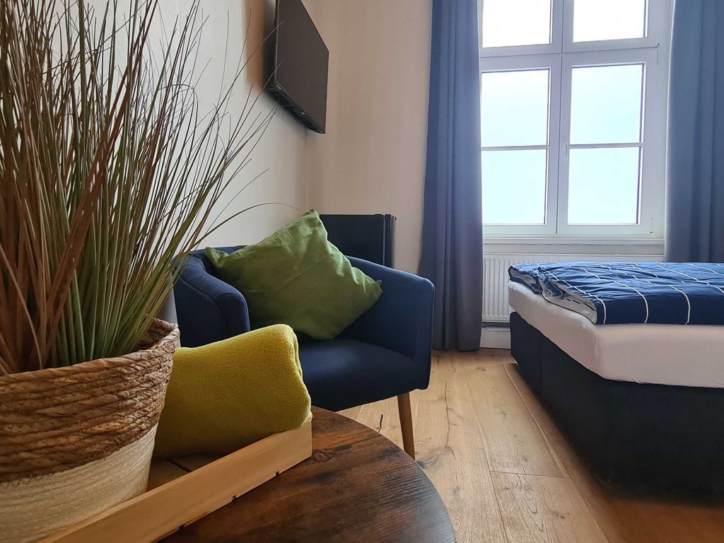 Doppelzimmer und Einzelzimmer modern und praktisch ausgestattet