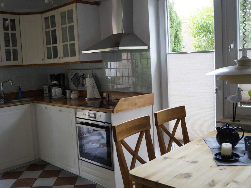 Kitchen and dining area with access to the terraces