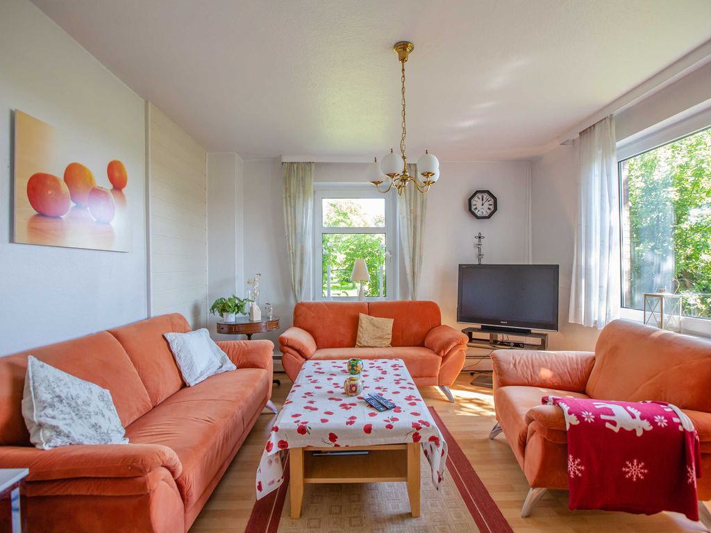 Wohnzimmer Wohnung 1 (mit TV)