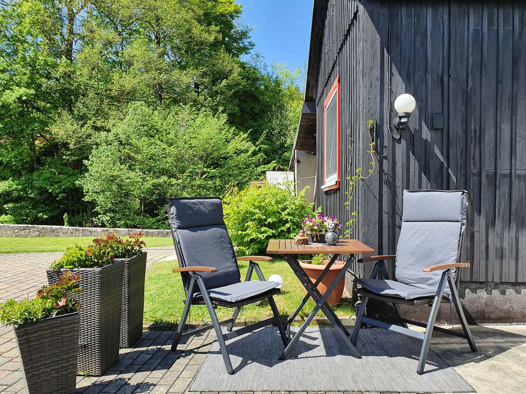 Kleine Sitzecke vor dem Ferienhaus