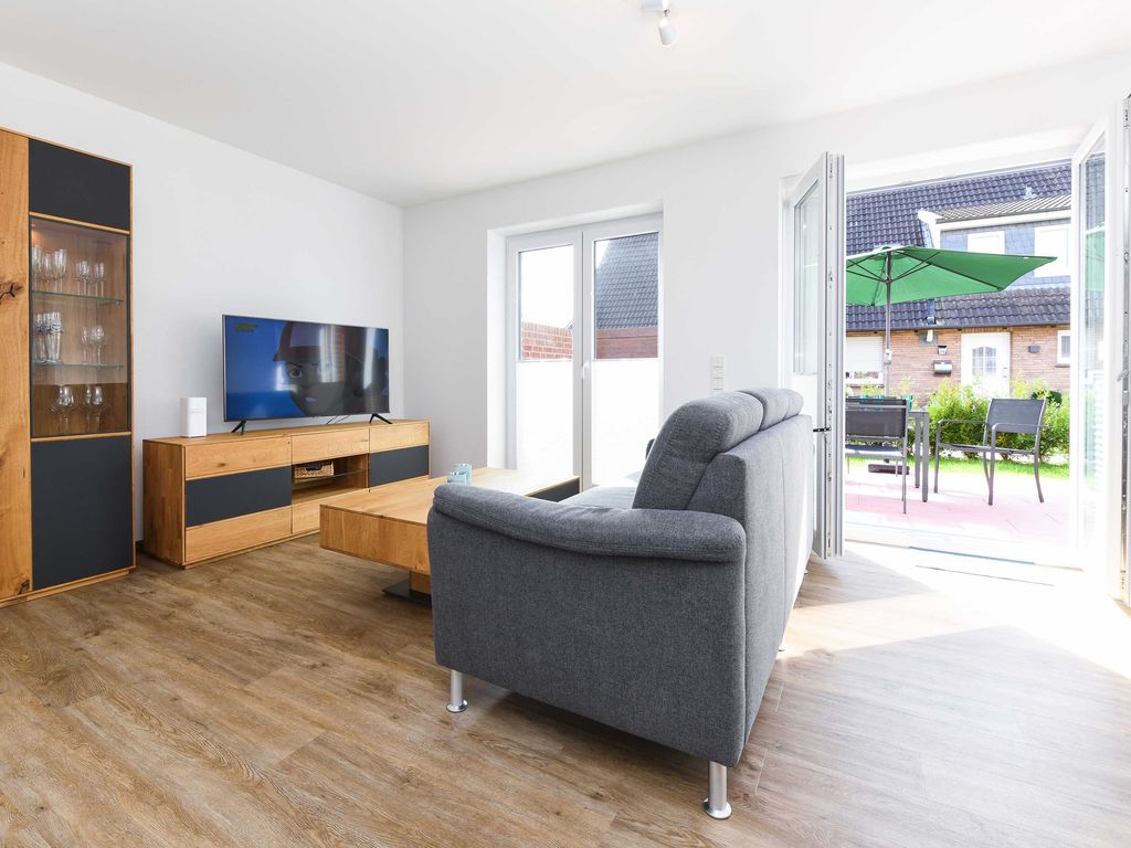 Wohnzimmer mit integriertem Küchenbereich