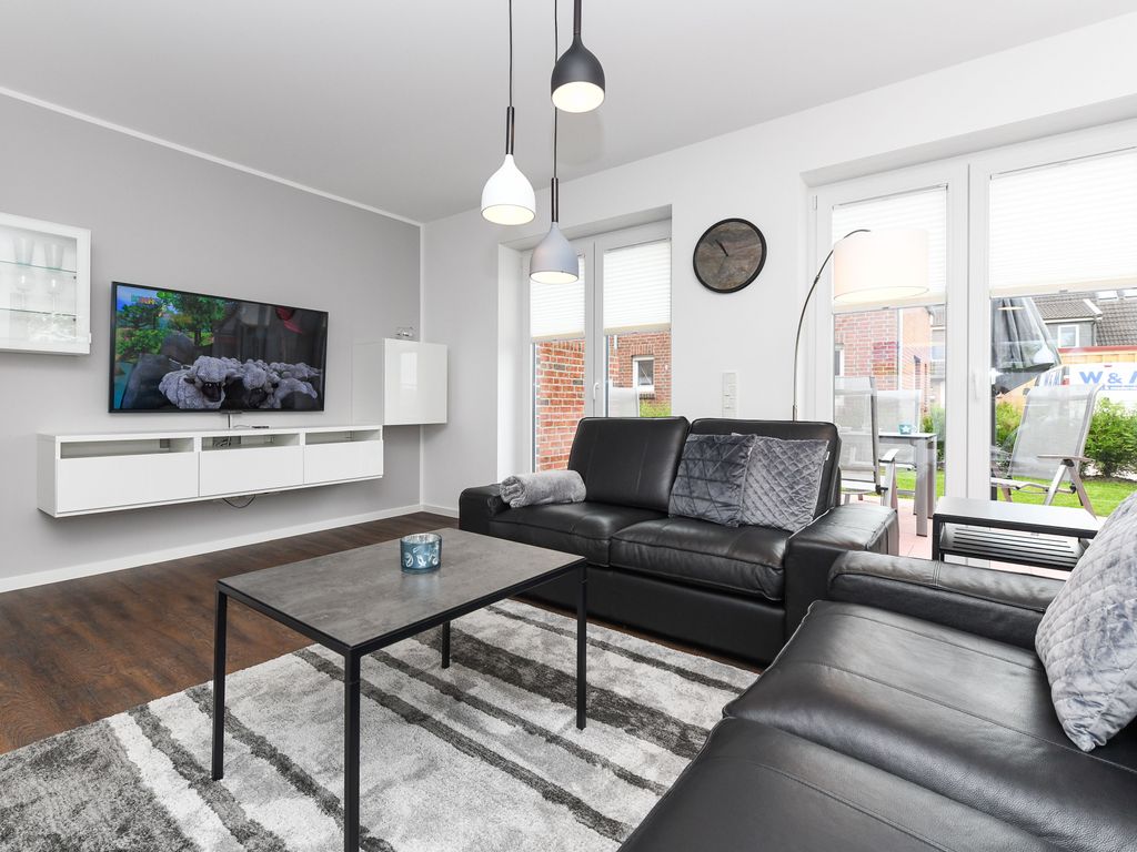 Wohnzimmer mit integriertem Küchenbereich