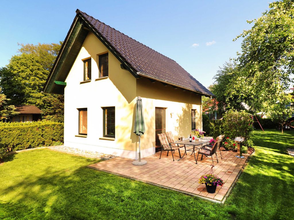 Ferienhaus mit Sitzecke und Grillplatz