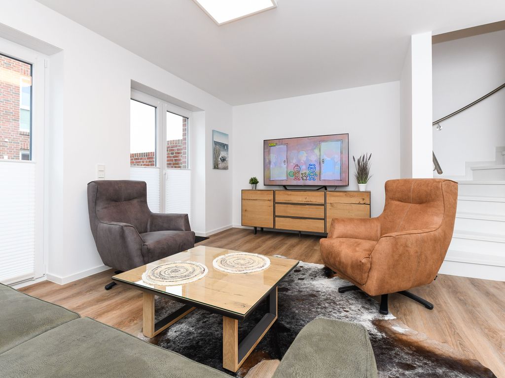 Wohnzimmer mit integriertem Küchenbereich