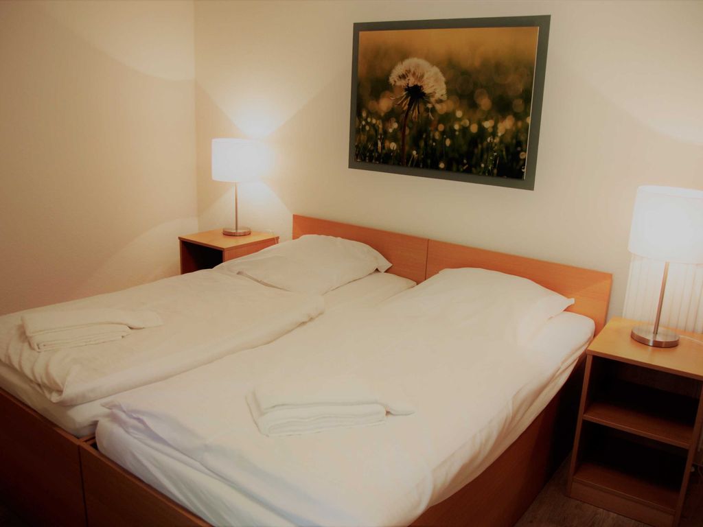Doppelbett in den Ferienwohnungen