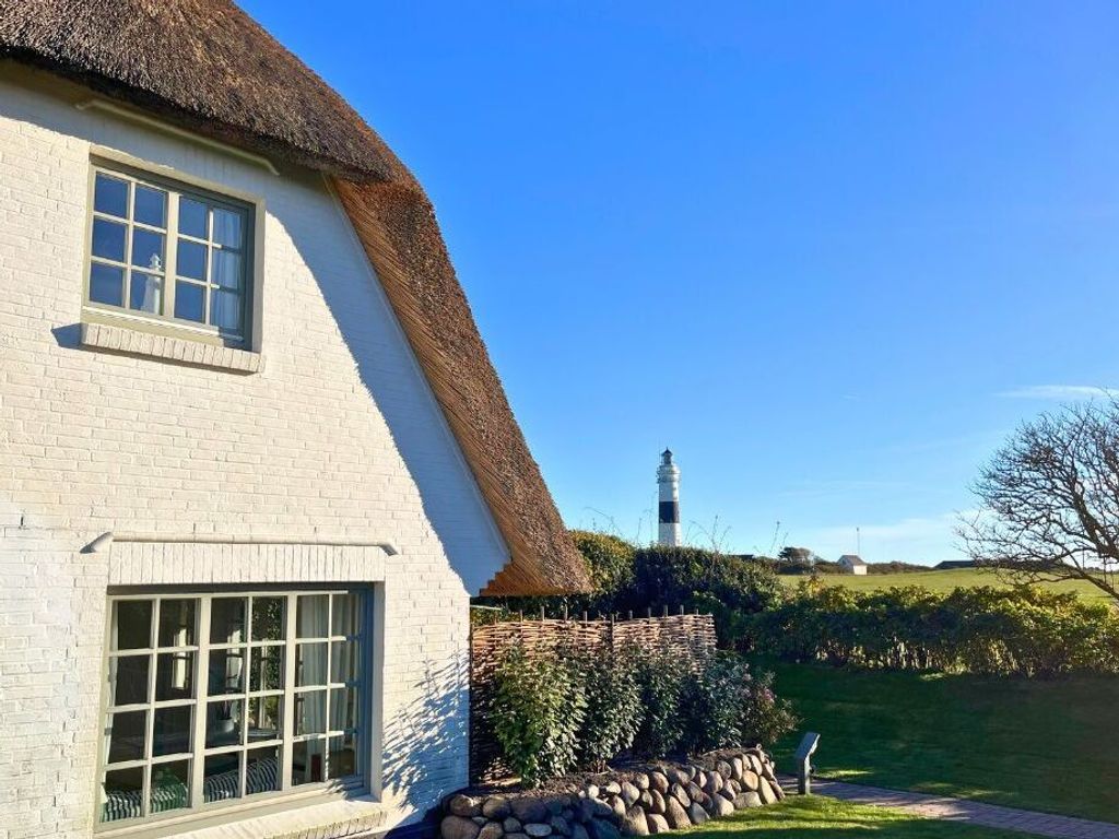 Haus und Leuchtturm