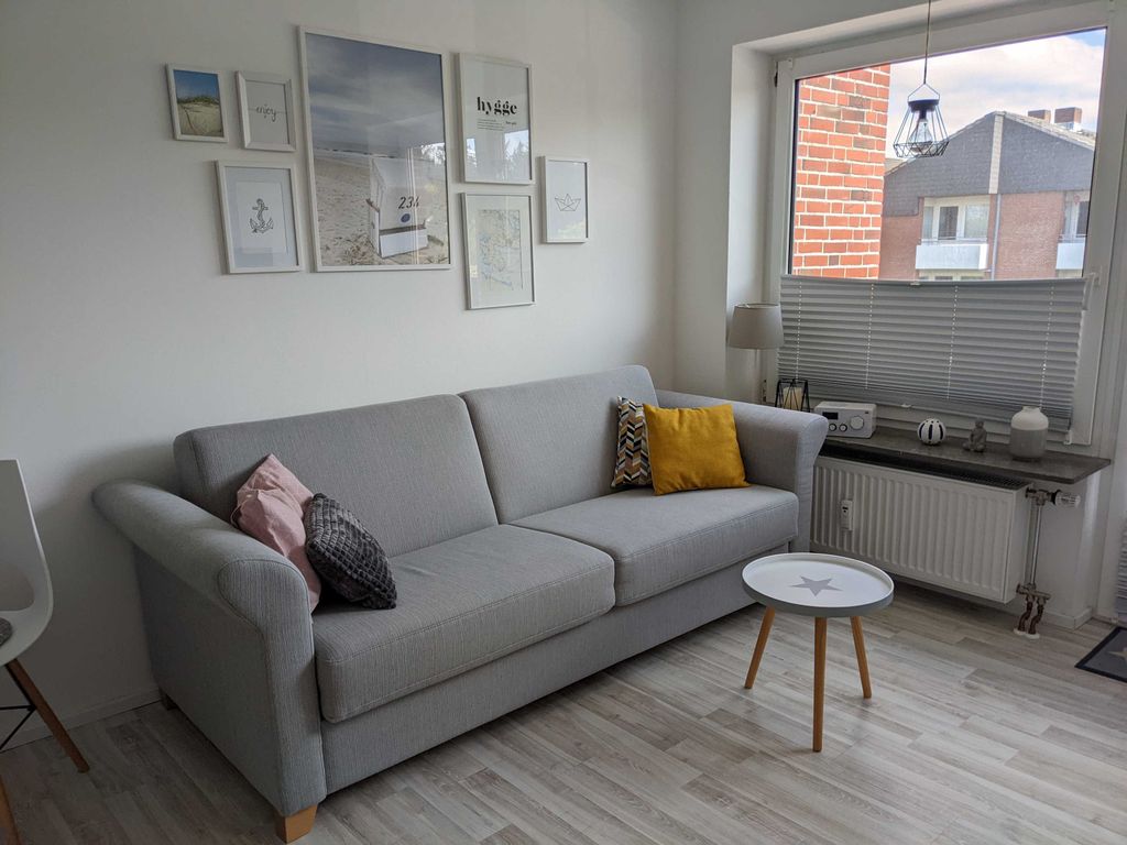 Wohnzimmer mit Schlafsofa